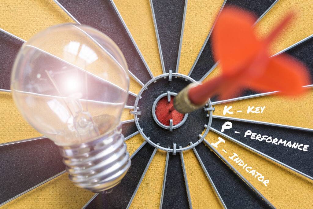 kpi key performance indicator with idea lamp target scaled